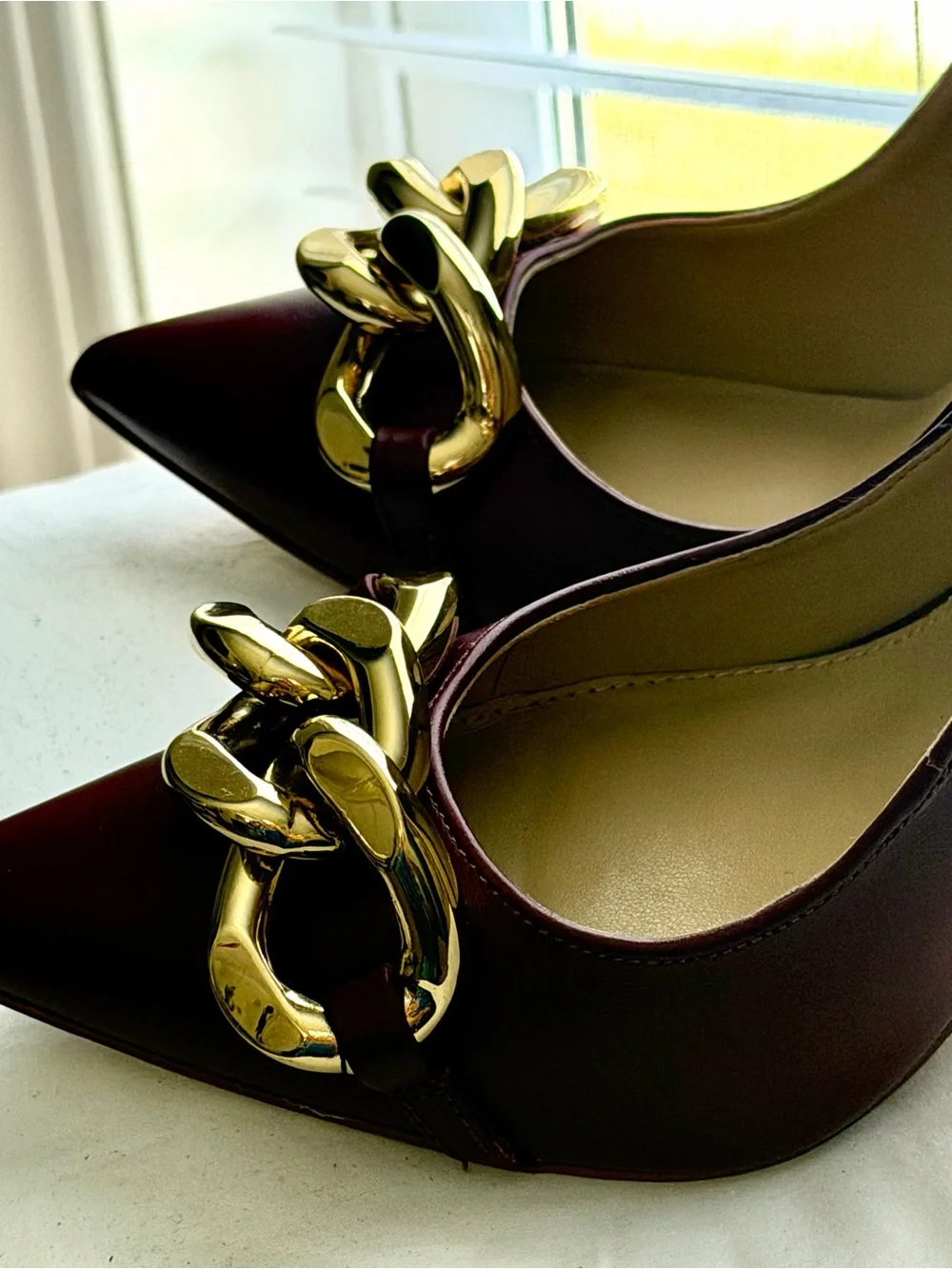 Michael Kors Burgundy Pointed Toe Pumps with Gold Chain Accent